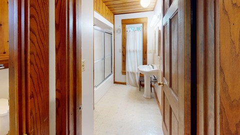 A bathroom with a sink and a toilet.