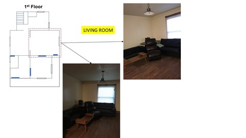 A living room with a couch and a coffee table.