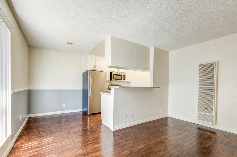 Apartment Kitchen and living room at The Palms Apartments in Hawthorne Los Angeles California.