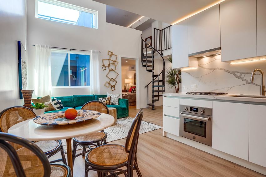 a kitchen and living room in a 555 waverly unit - Photo Gallery