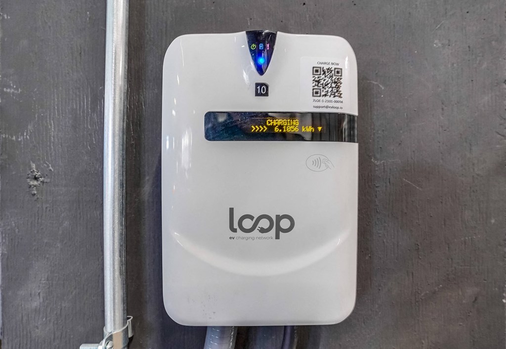 a white loo with a sticker on the side of it