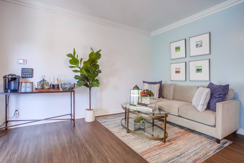 a living room with a couch and a coffee table