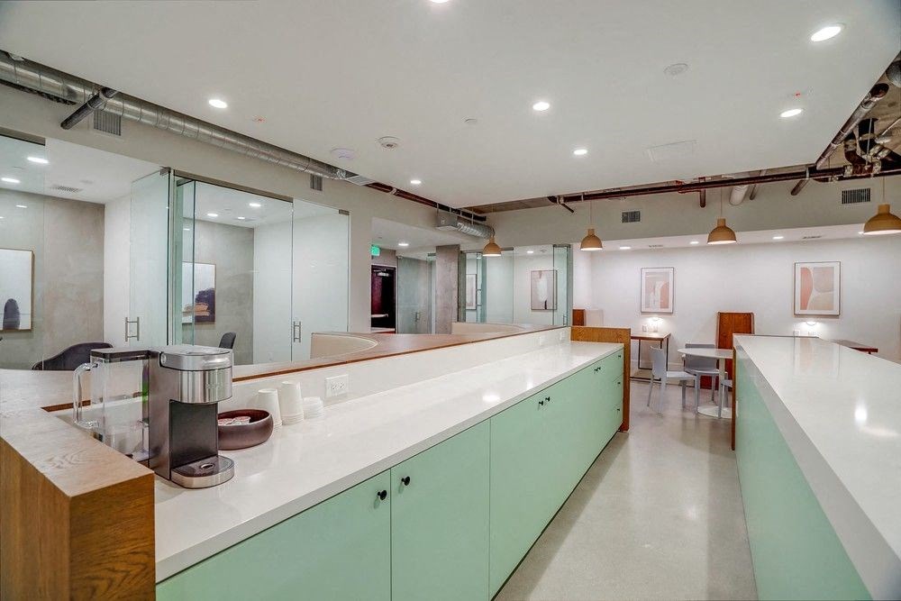 a kitchen with a counter top and a sink
