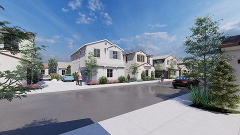 A street view of a residential area with houses and parked cars.
