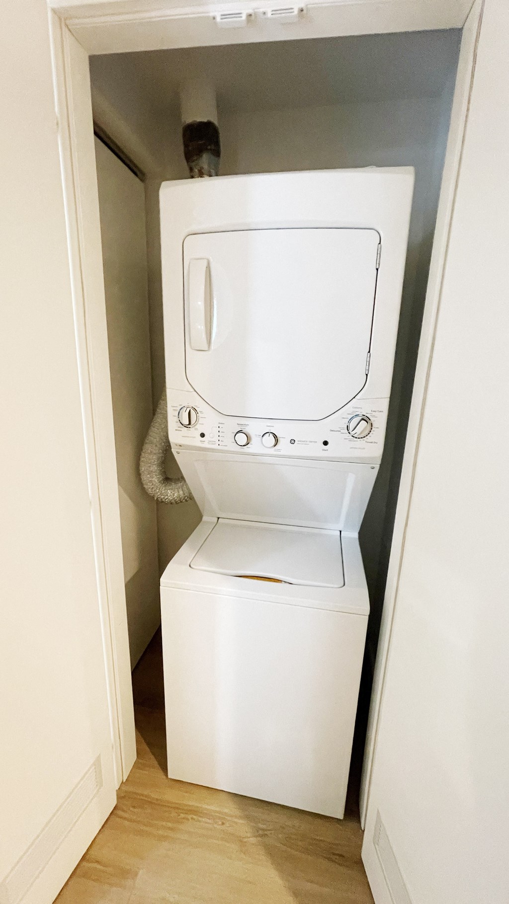 a small laundry room with a washer and dryer in it