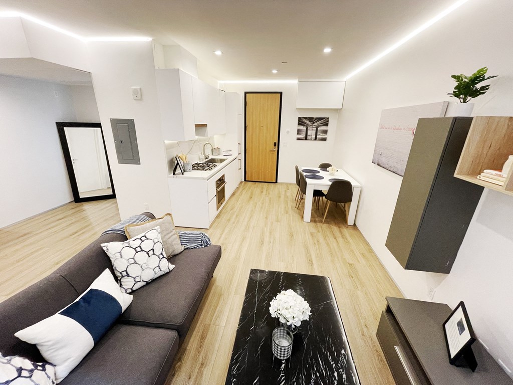 a living room with a couch and a table