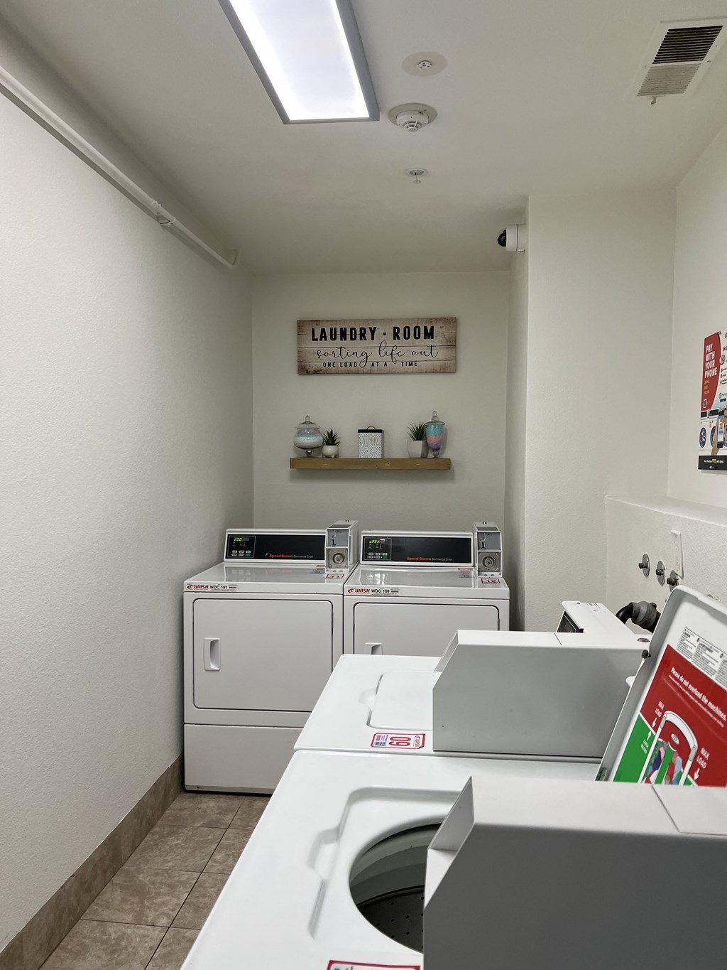Laundry Care Center at The Imperial Apartment Homes in Santa Ana, California.