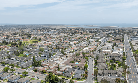 A view of a residential area with houses and roads.