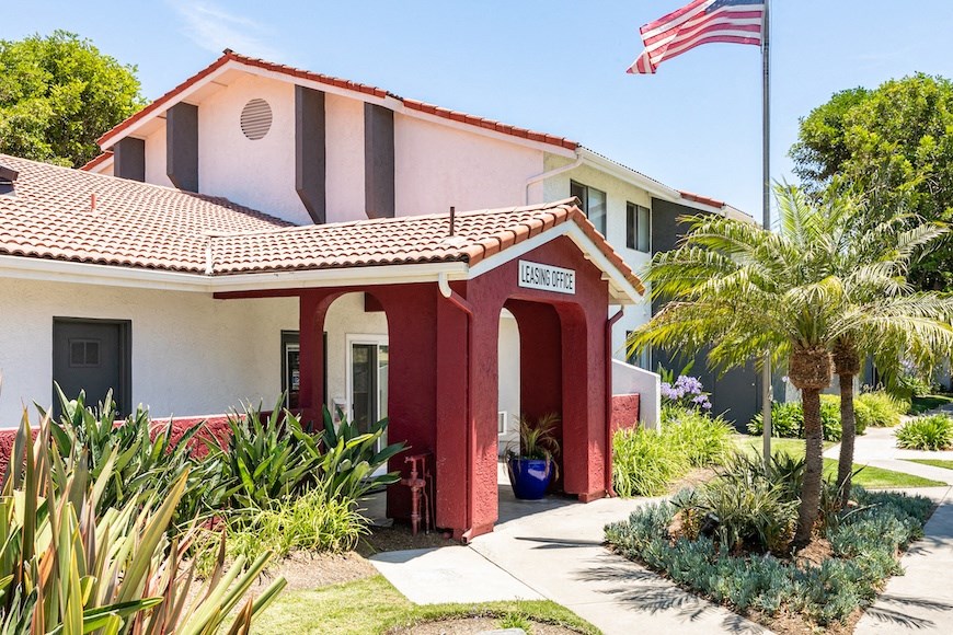 a house with an american flag in the background