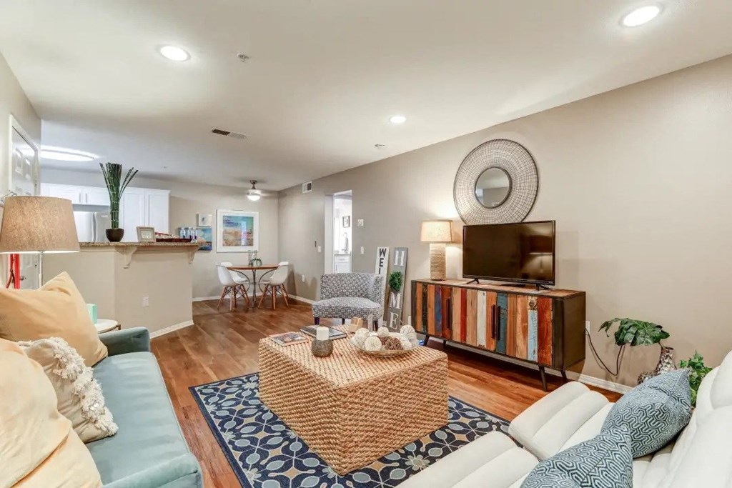 a living room with a couch and a tv
