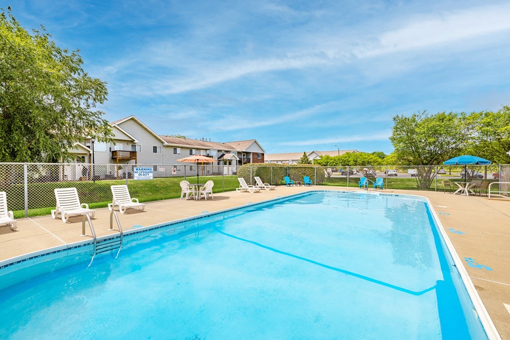 our apartments have a resort style pool with chairs