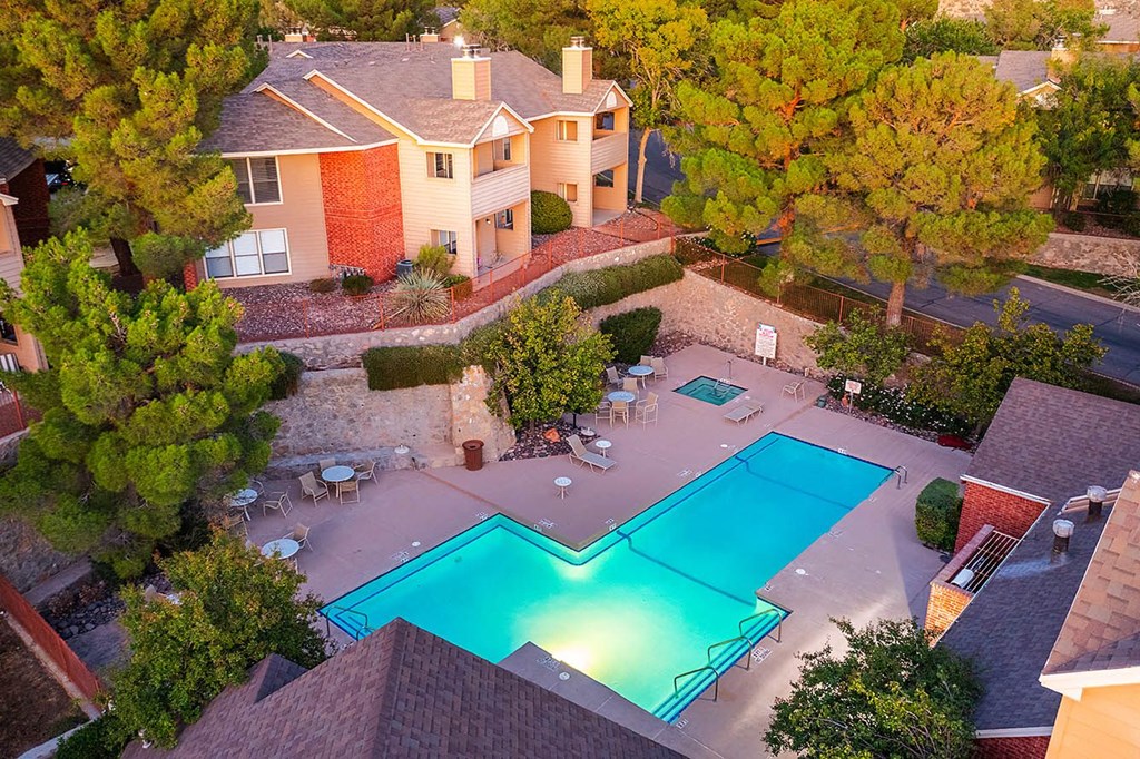 A house with a pool in the backyard.