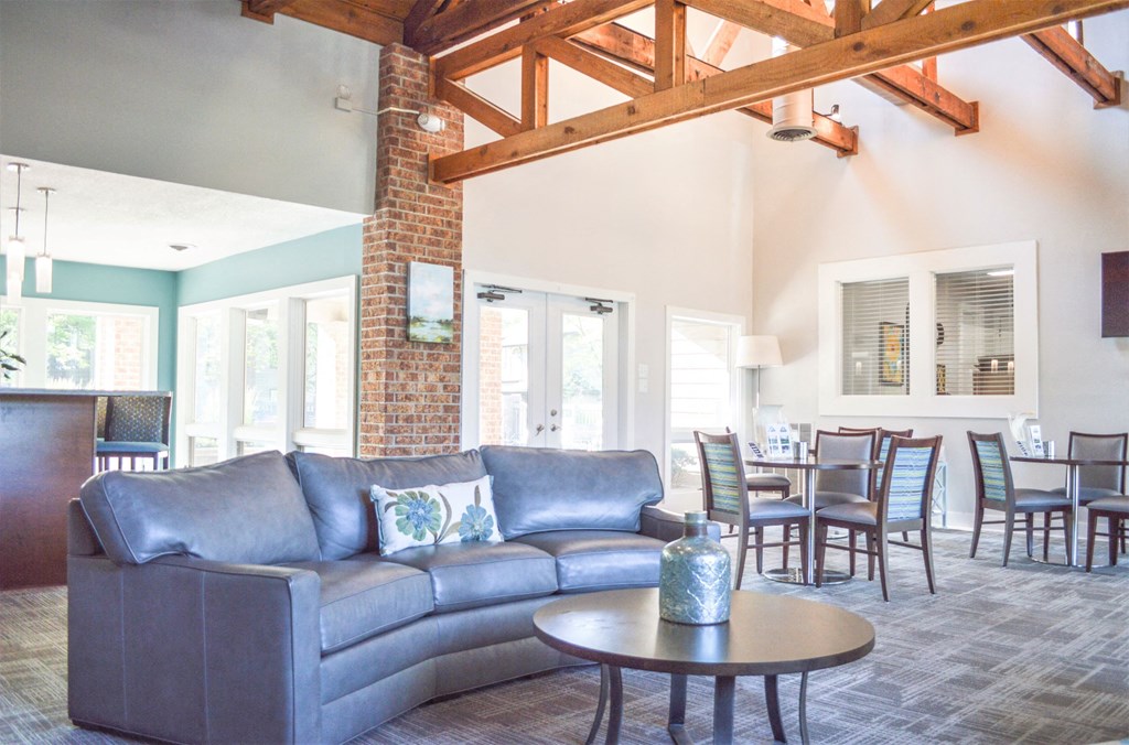 a living room with a couch and a table