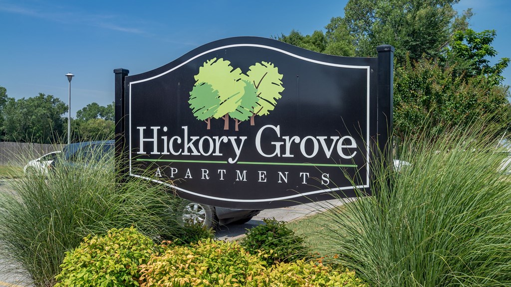 the sign at hickory grove apartments