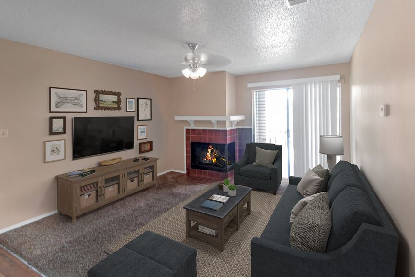 a living room with a fireplace and a couch