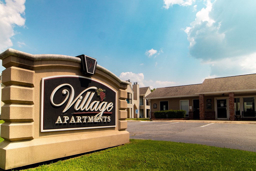 The Village Apartments Sign