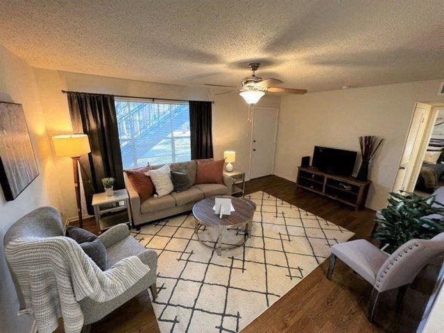 a living room with a couch and a table