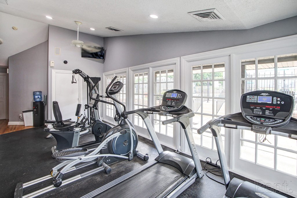 the gym is equipped with treadmills and other exercise equipment