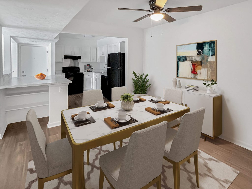 a dining room with a table and chairs