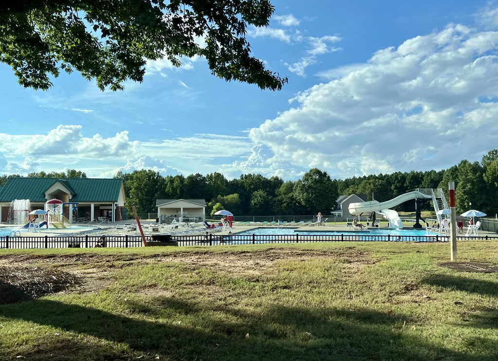 a view of the pool and water slides at a water park