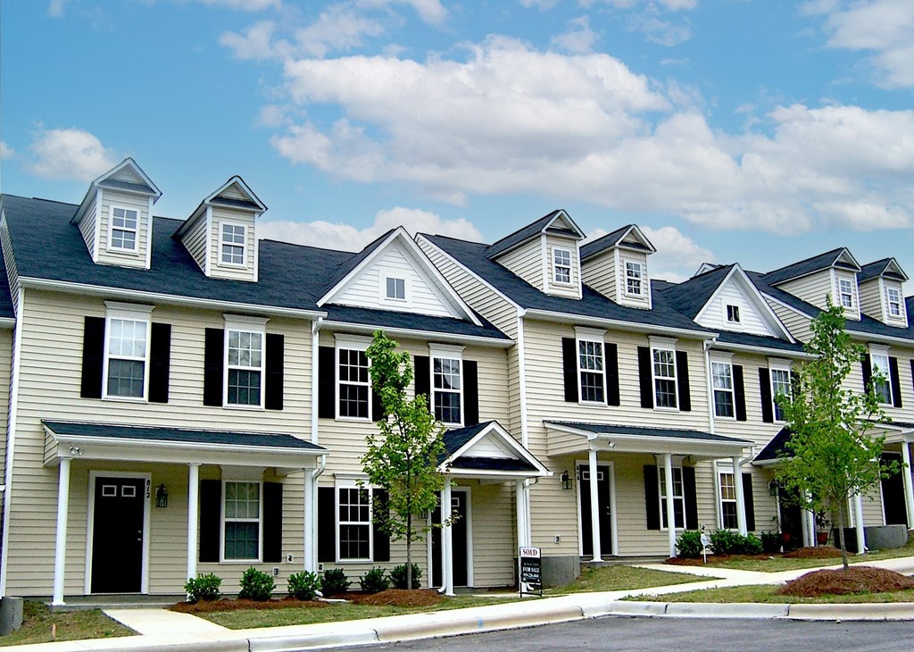 a row of town houses on a street