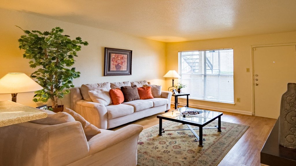 a living room with a couch and a coffee table