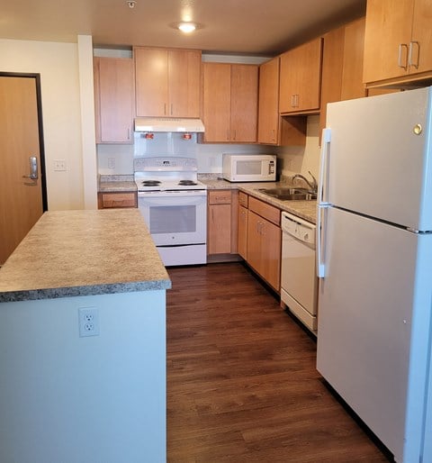 Kitchen w/ island table  at The Willows, Shakopee, MN, 55379