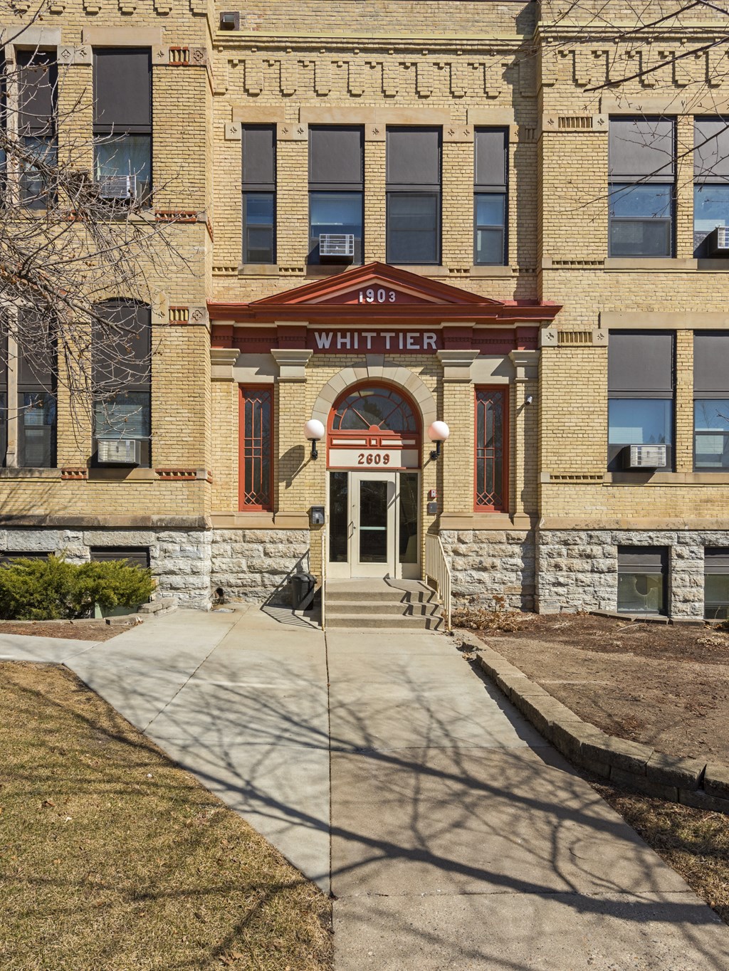 the exterior of the white tiger building