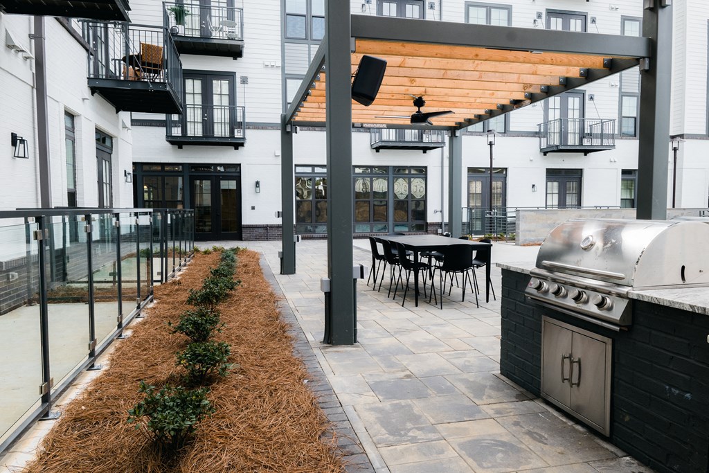Outdoor Grill With Intimate Seating Area at The Quarter House, Jackson, Mississippi