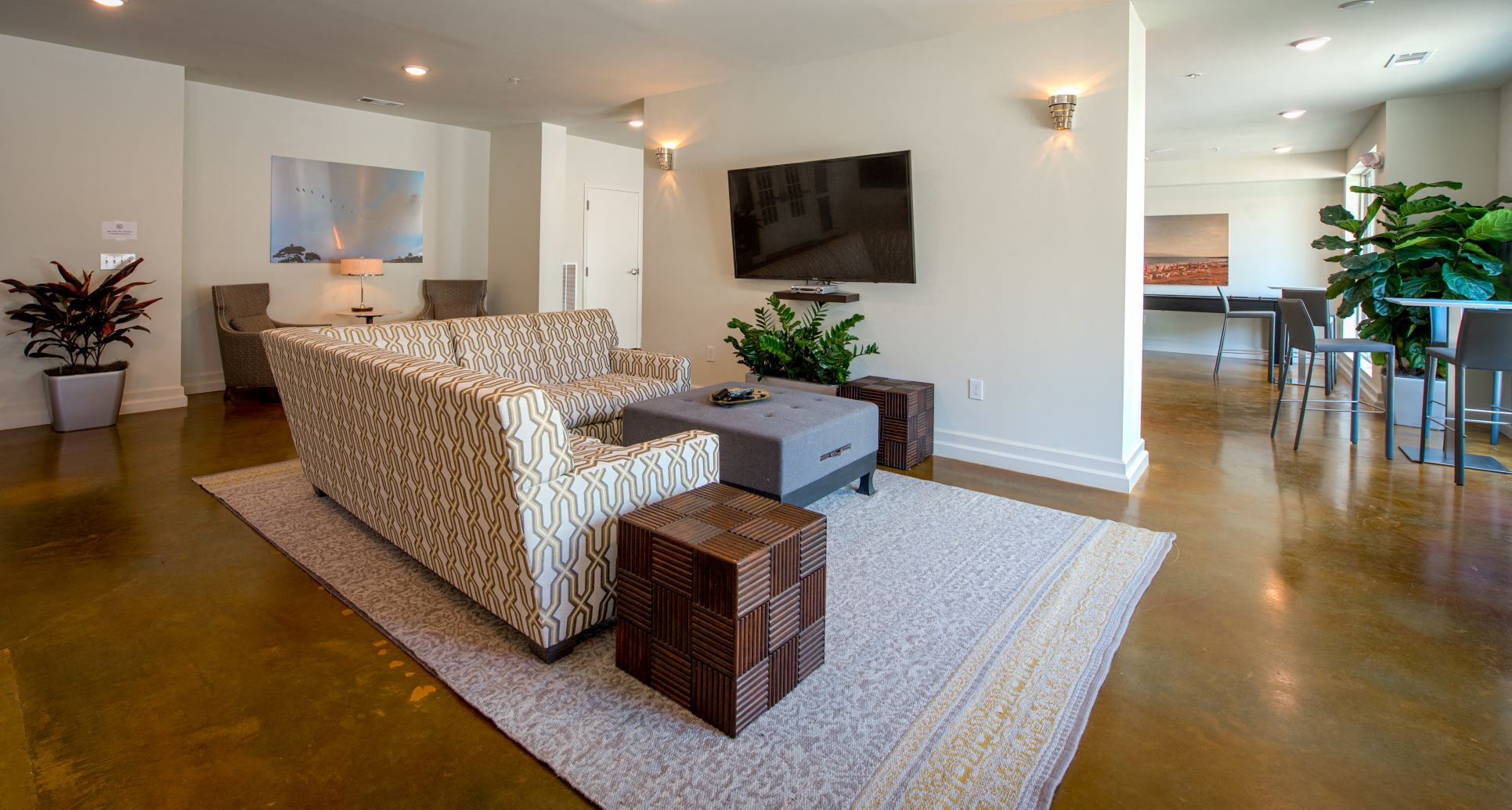 a living room with a couch and a table