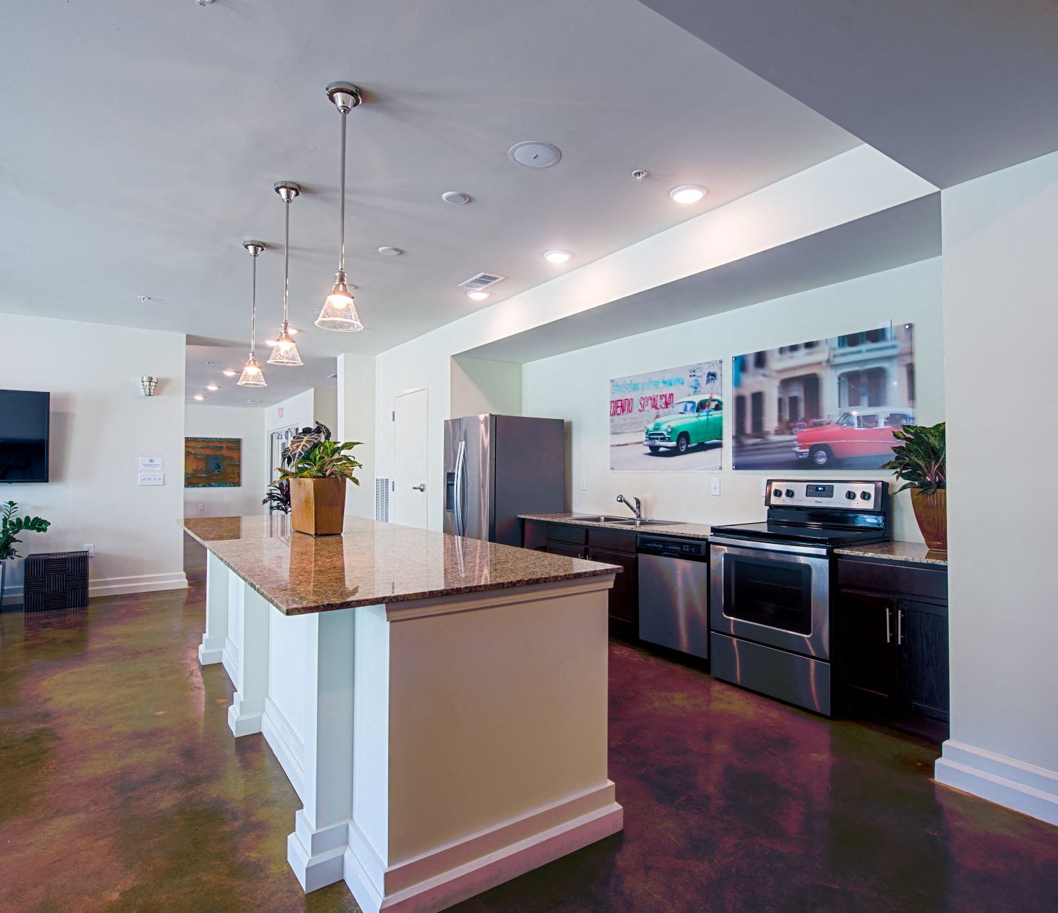 a kitchen with a counter top and a refrigerator