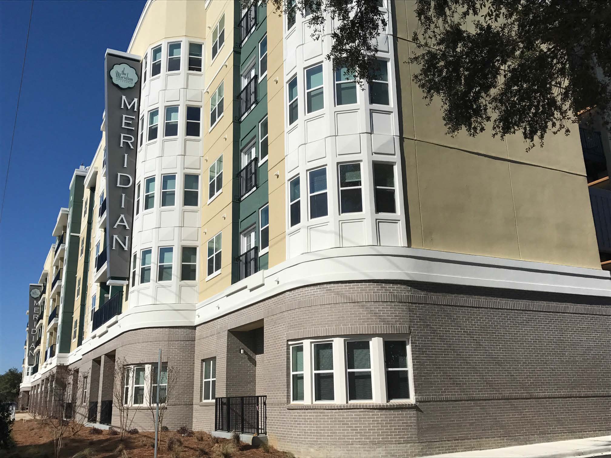 a building with a clock on the side of it