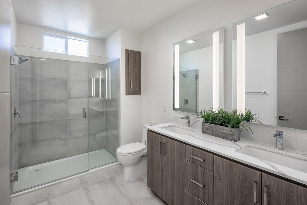 the preserve at ballantyne commons bathroom with toilet sink and shower