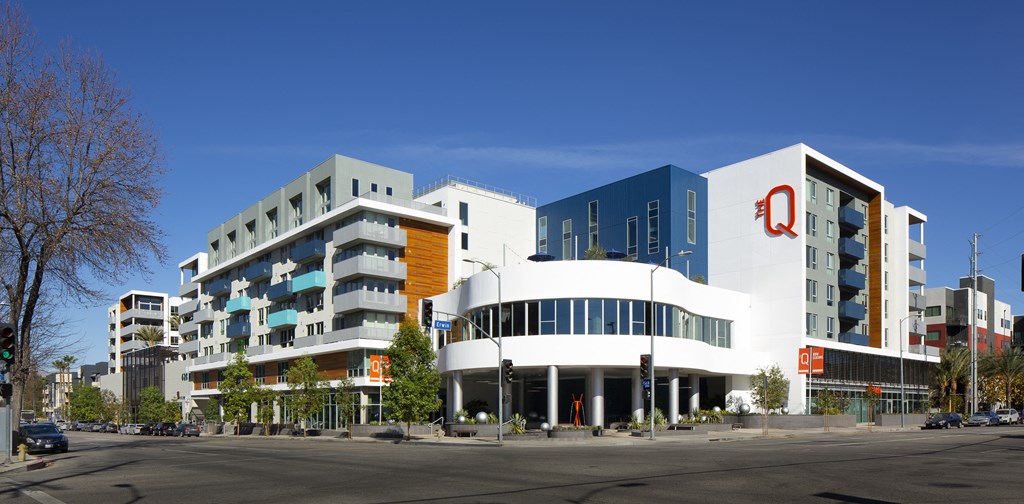 a group of modern buildings on a city street