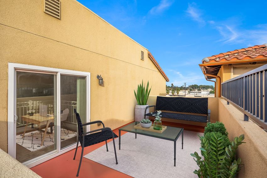 patio with chair and table patio with chair and table patio with chair and table at Le Blanc Apartments, Canoga Park, CA
