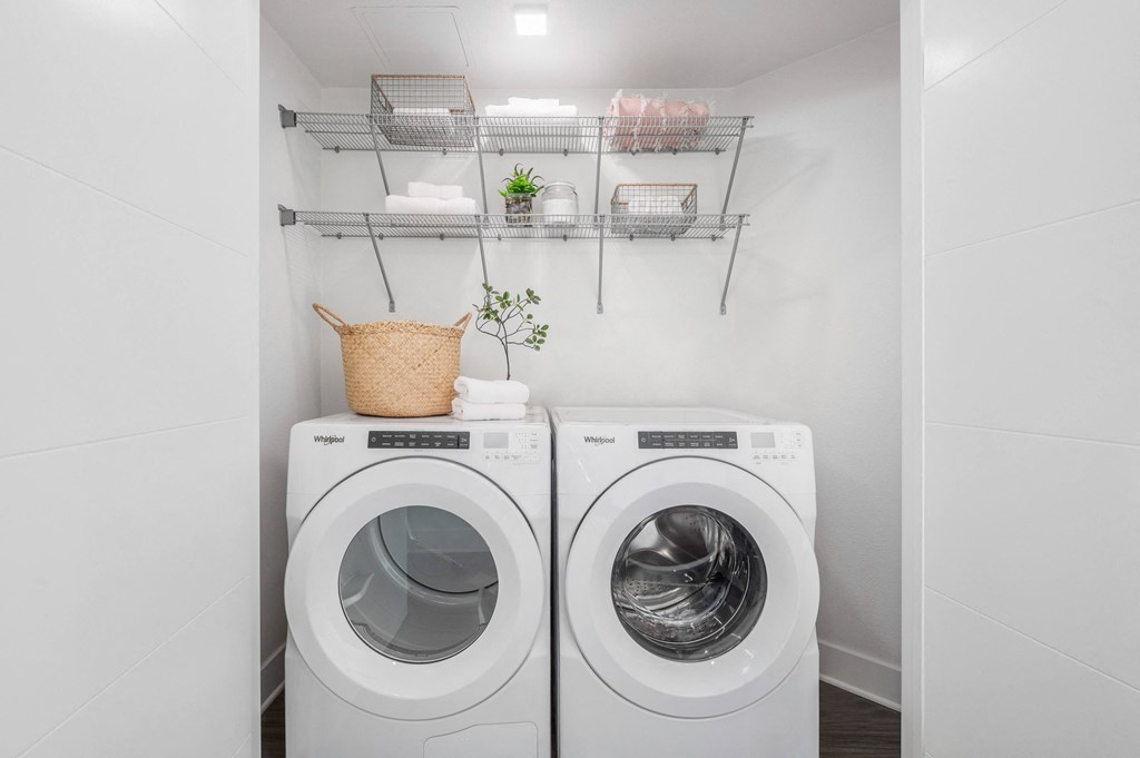 Front load washer and dryer in linen closet