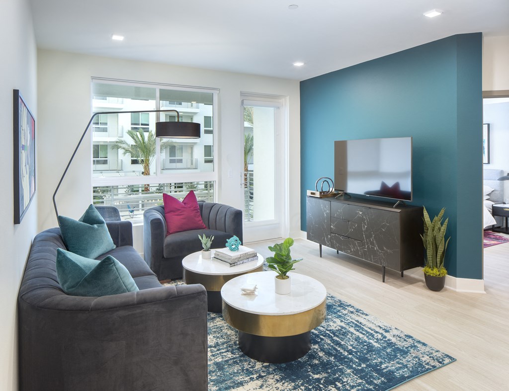 a living room with couches and a coffee table