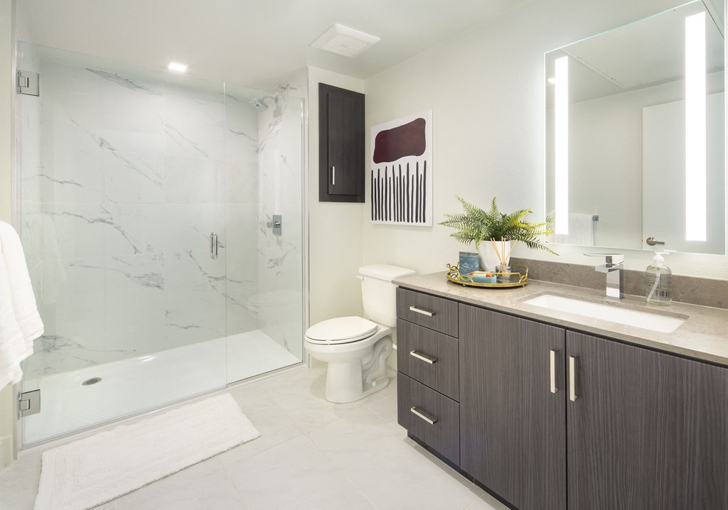 Renovated Bathrooms With Quartz Counters at The Q Topanga, Woodland Hills