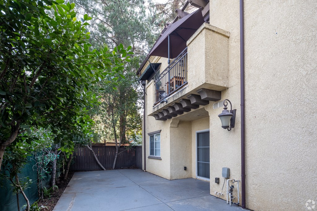 a view of the back of the house from the driveway at The Village Apartments, Van Nuys, CA