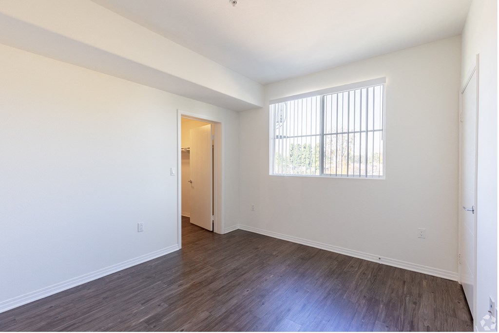 Hardwood laminate Flooring,Bedroom with window at Legacy Apartments, Northridge, 91325