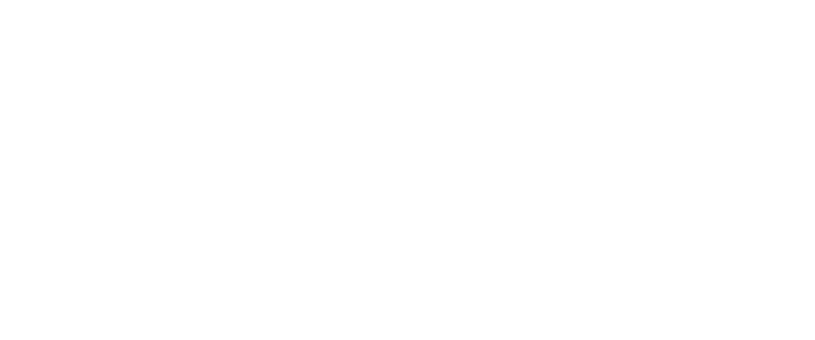 A green sign with the words "Legacy Valley Village" in white.