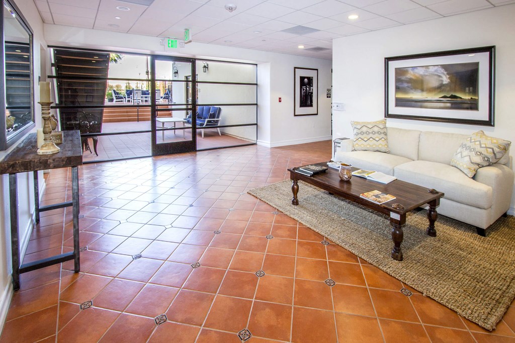 a living room with a couch and a coffee table at Le Blanc Apartment Homes, California, 91304