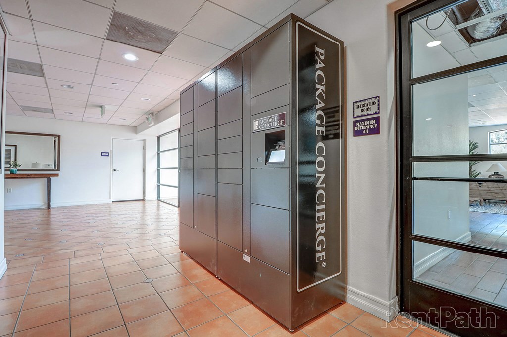 a stainless steel elevator in a lobby of a building at Le Blanc Apartment Homes, California