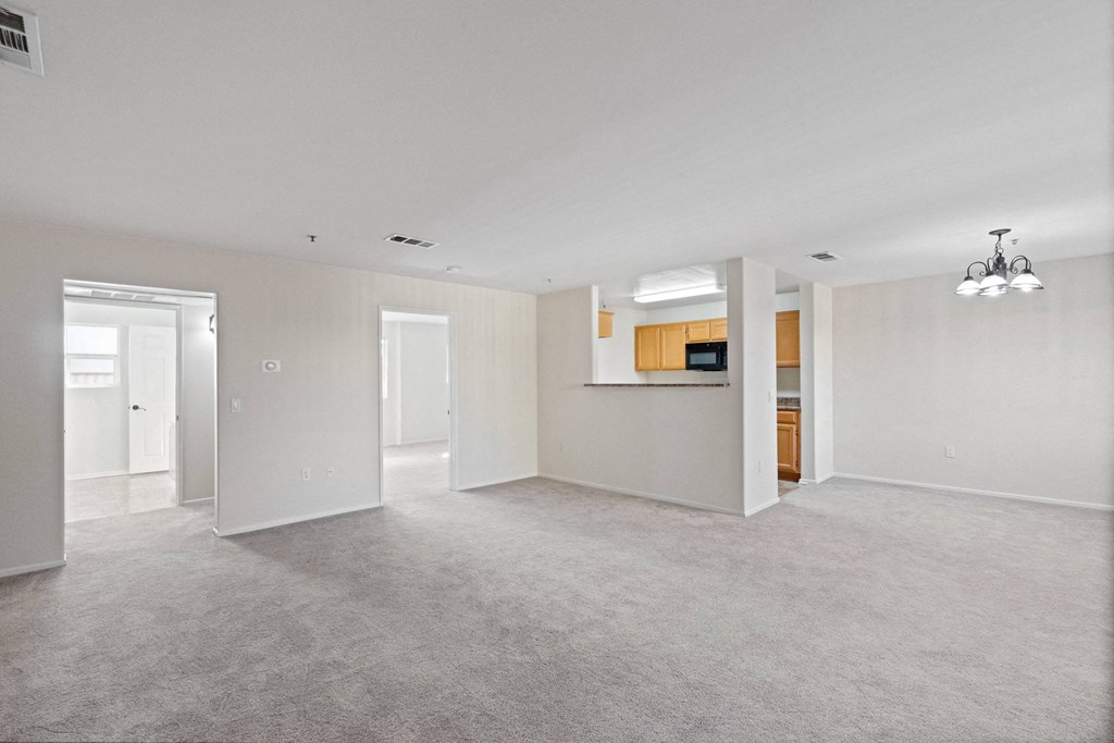 the spacious living room and kitchen in a new home at Dronfield Astoria Sylmar, 91342