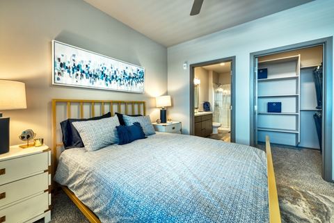 Bedroom with bed and bathroom at Cuvee, Glendale Arizona 