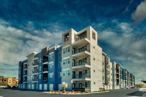 Exterior view of Cuvee apartment building with a blue sky background at Cuvee, Glendale