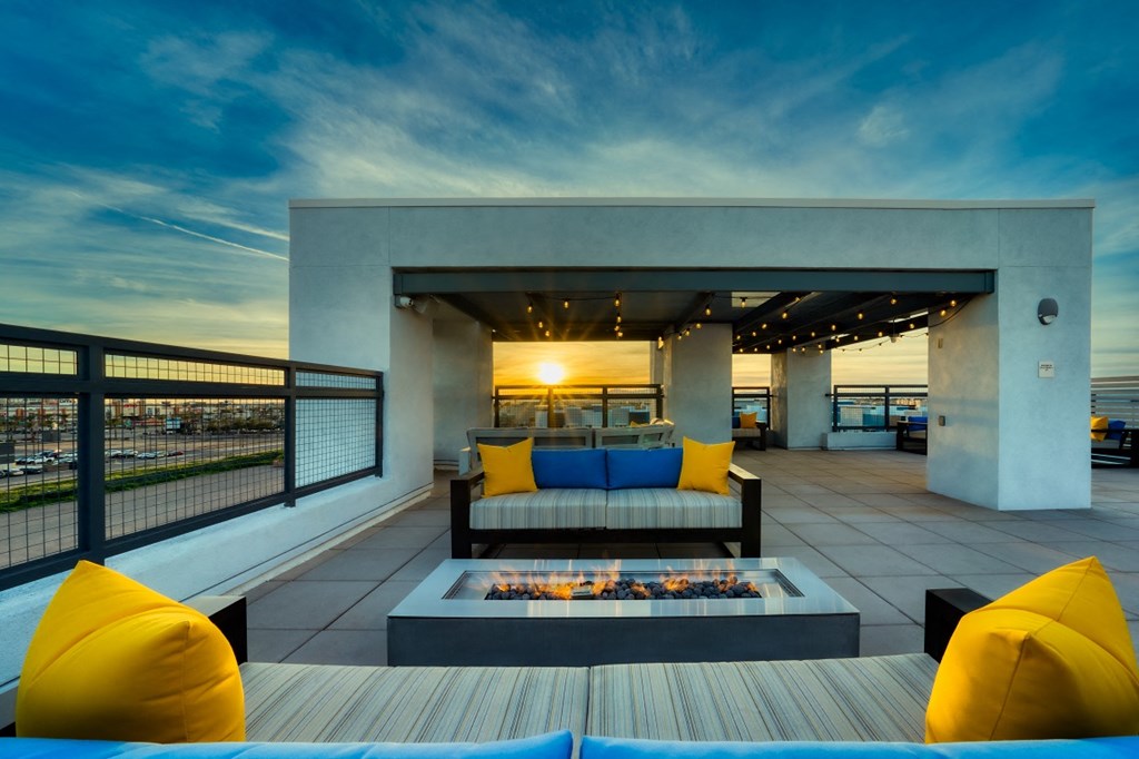 Rooftop patio with tables and chairs and firepit at Cuvee, Glendale, AZ 85305