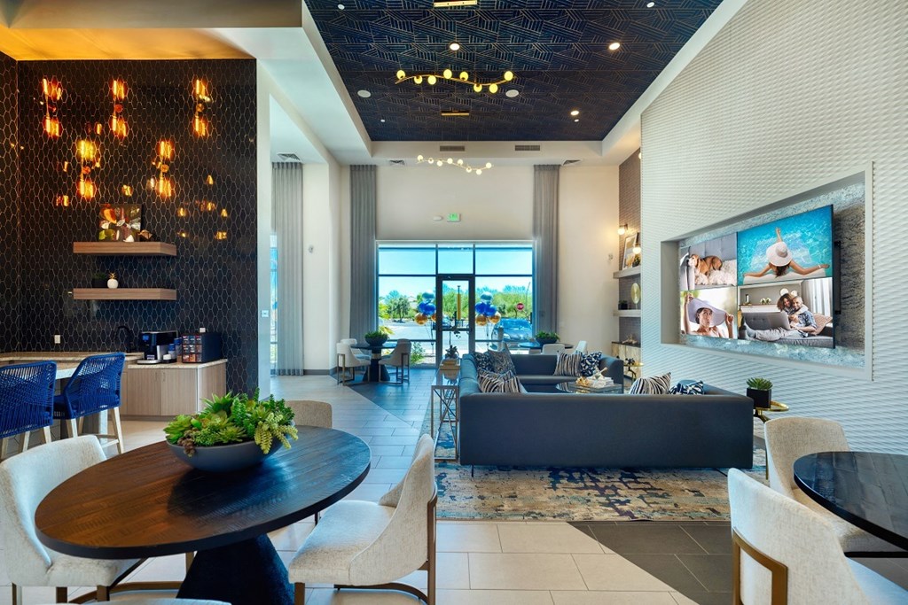 the lobby and clubhouse of Cuvee with blue couch at Cuvee, Glendale Arizona