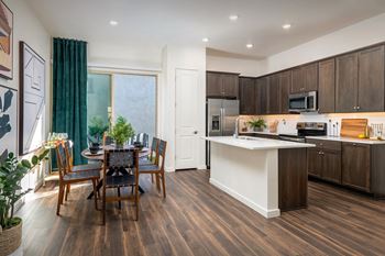Stainless Steel Appliances and vinyl wood plank flooring at Pillar at Fountain Hills apartments
