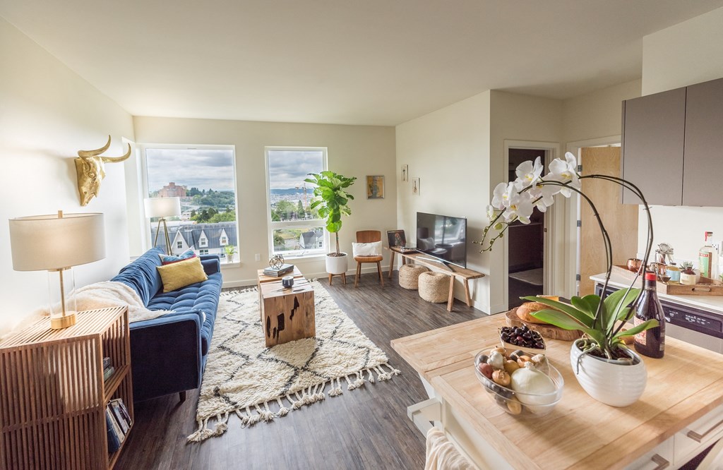 a living room with a couch and a table